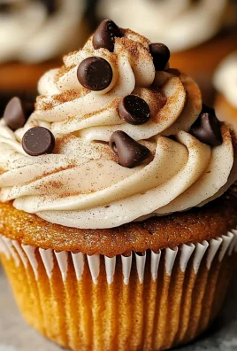 Delicious Pumpkin Cupcakes Recipe with Creamy Frosting and Toppings